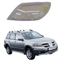 Стекло фары Mitsubishi Outlender 1 2003-07г левое