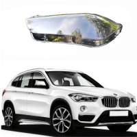 Стекло фары BMW X1 E48 левое 2015-2019