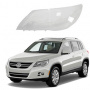 Стекло фары Volkswagen Tiguan 2007-2011 левое.